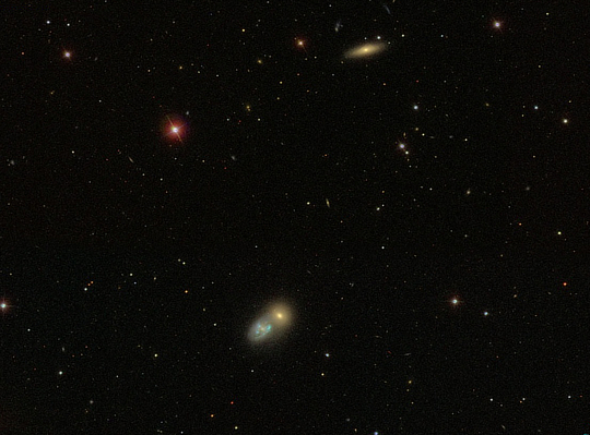 An image of galaxies NGC 274, NGC 273 and NGC 275 in Cetus provided by the Sloan Digital Sky Survey (SDSS)