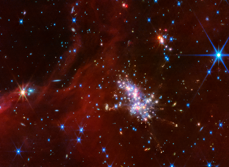 An image of an open cluster at the heart of the Digel Cloud 2S in Cassiopeia in infrared wavelengths by the JWST courtesy of NASA, ESA, CSA, STScI, Michael Ressler (NASA-JPL)